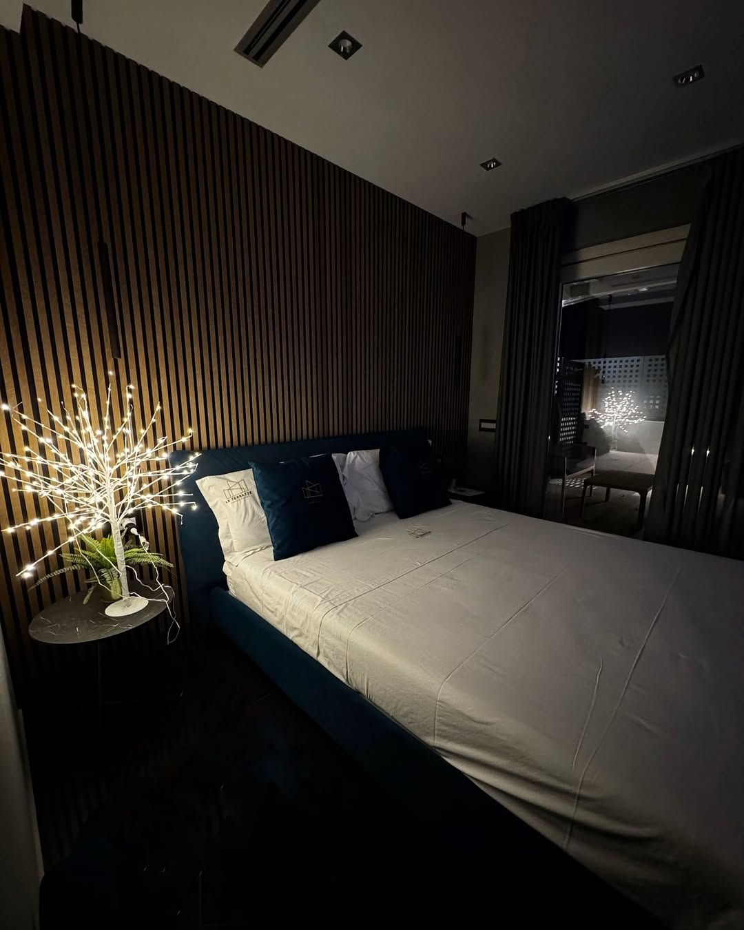 An evening suite at Le Terrazze, lit in warm light